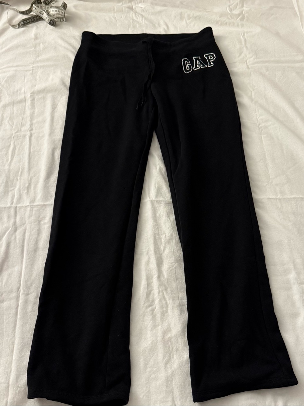 Black Gap sweatpants with white logo, size M
